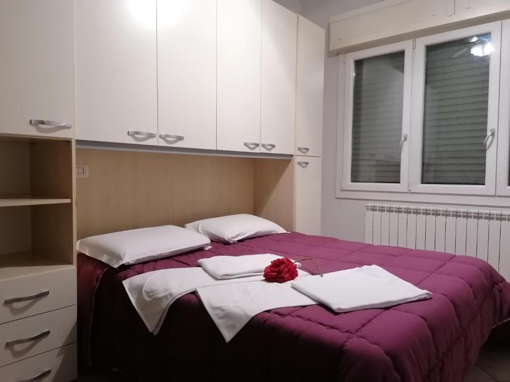 Posteľ alebo postele v izbe v ubytovaní Villa Glori affitto camere monolocali