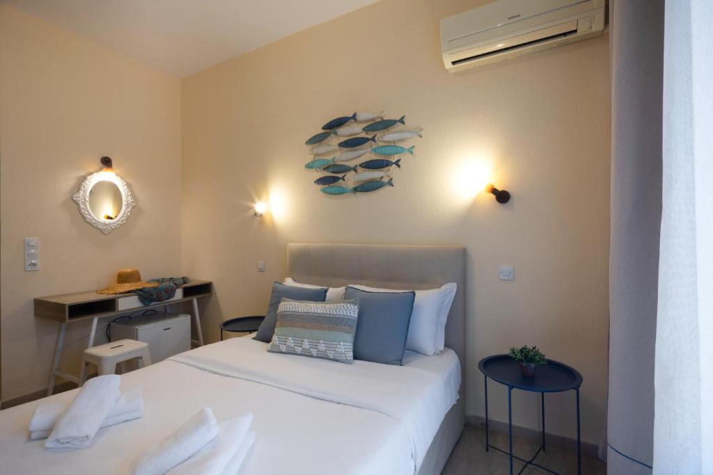 Postel nebo postele na pokoji v ubytování Aurora Beach Hotel