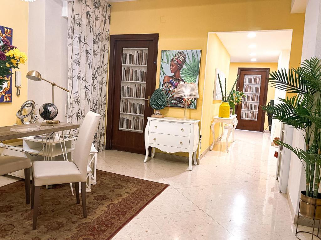 a living room filled with furniture and decor at Al Politeama Rooms B&B in Palermo