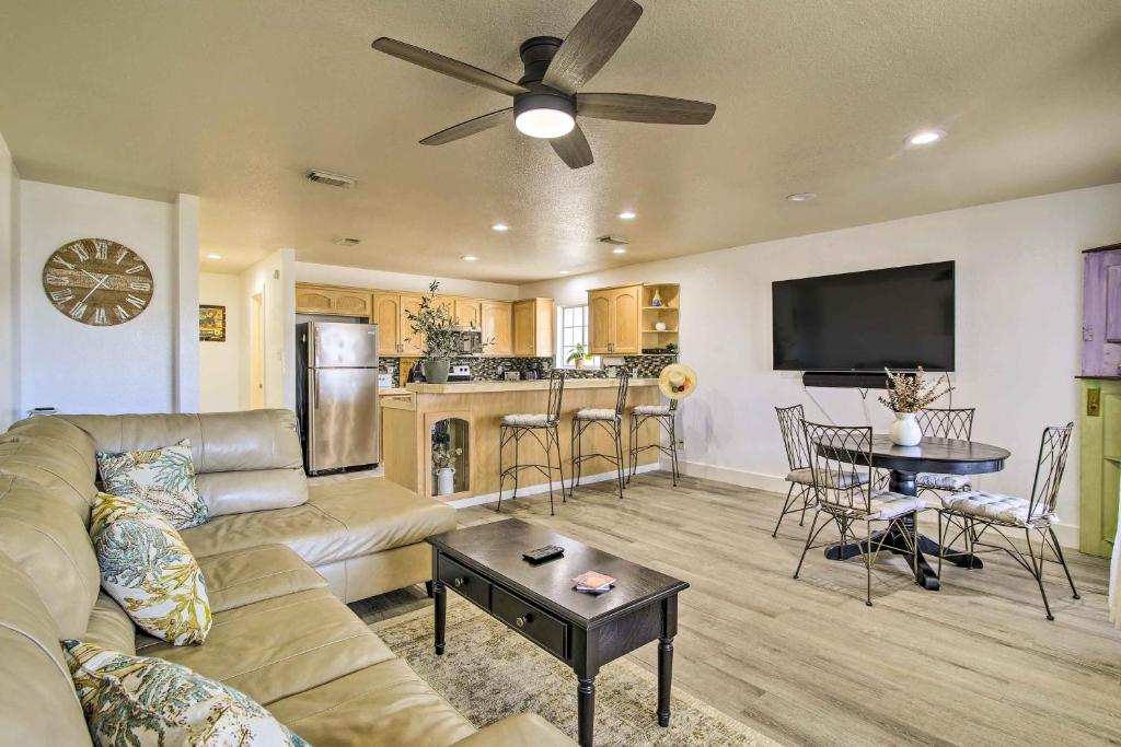 a living room with a couch and a table at South Padre Island Getaway - Newly Renovated! in South Padre Island