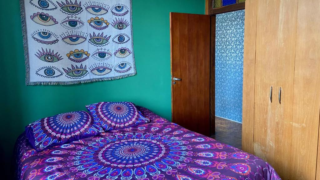 Cama ou camas em um quarto em Vila Santê