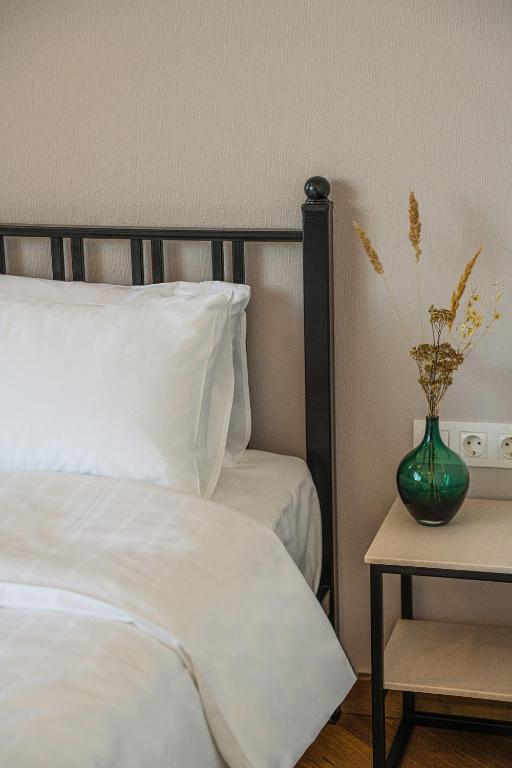 Postel nebo postele na pokoji v ubytování Makmani Boutique Hotel by DNT Group