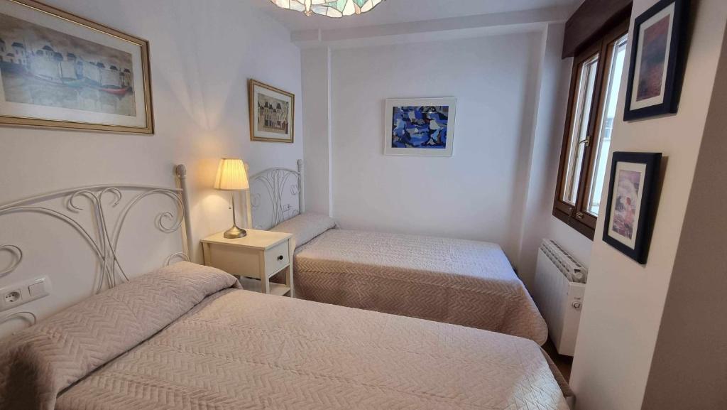 Postel nebo postele na pokoji v ubytování Apartamento vacacional Marita