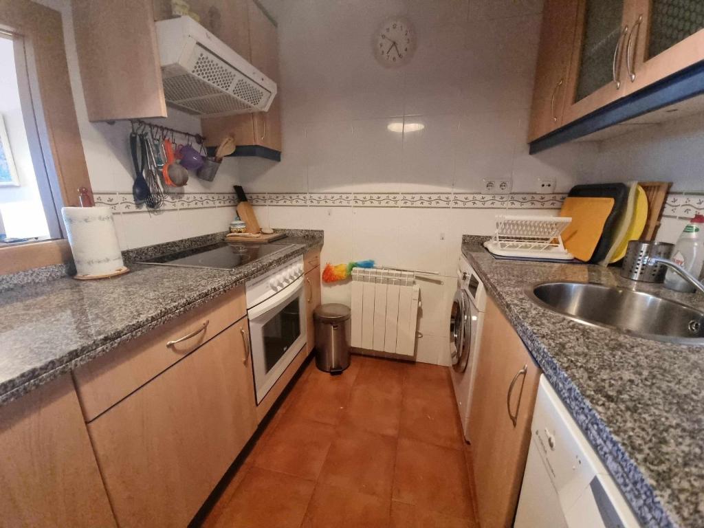 Kuchyň nebo kuchyňský kout v ubytování Apartamento vacacional Marita
