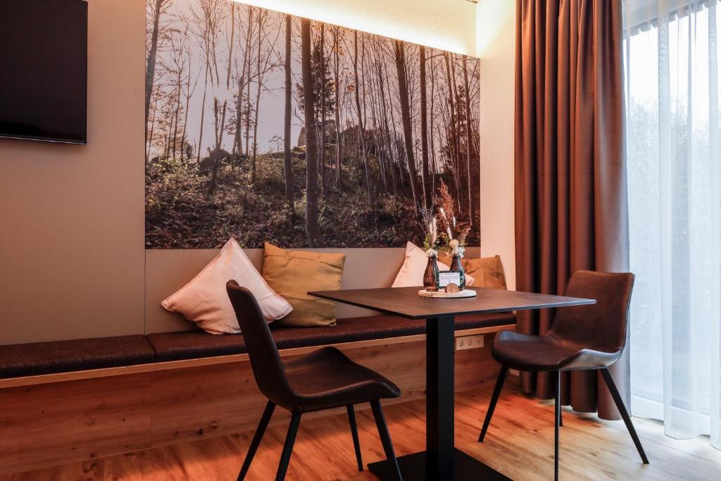 TV a/nebo společenská místnost v ubytování DAS GEORG Gästehaus in Epfendorf