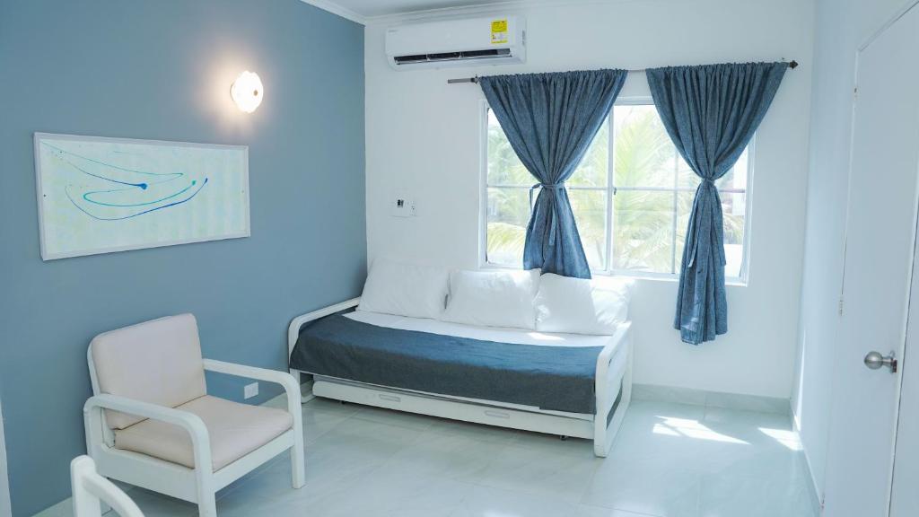 Una cama o camas en una habitación de Makáry Beach Tolú by Bernalo Hotels