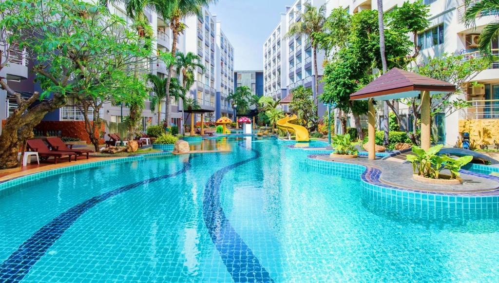a swimming pool at a hotel in singapore at Soi 7 Hua Hin - Ji Ya in Hua Hin