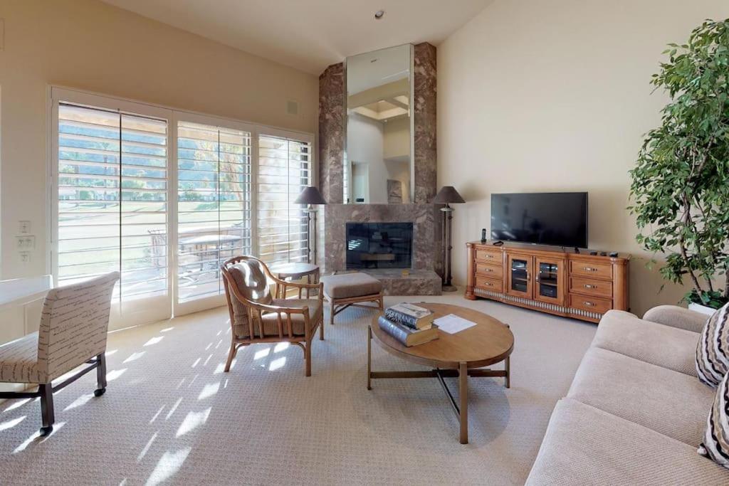 a living room with a couch and a table at PGA306 Roomy Single Story PGA West 3 Bedroom in La Quinta