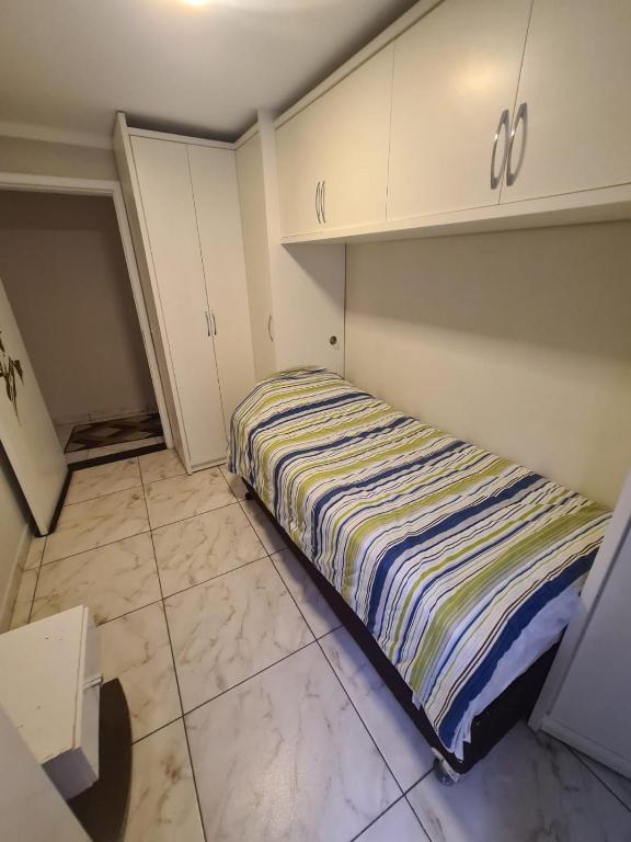 Postel nebo postele na pokoji v ubytování Hostel AJBJ Turismo