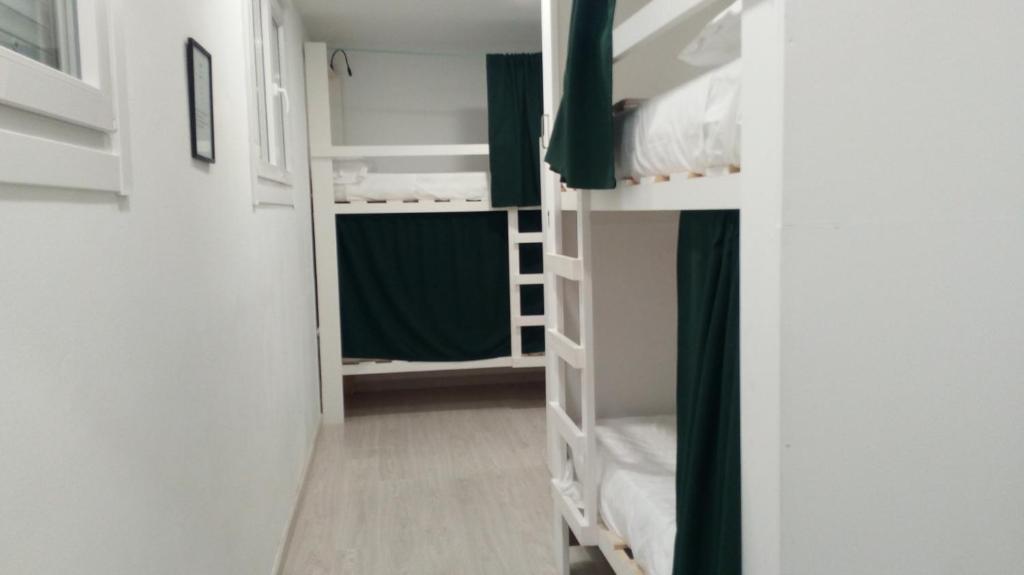 Postel nebo postele na pokoji v ubytování Fonte dos aloques