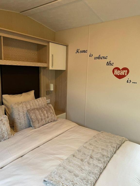 Postel nebo postele na pokoji v ubytování Casa Nymphaea
