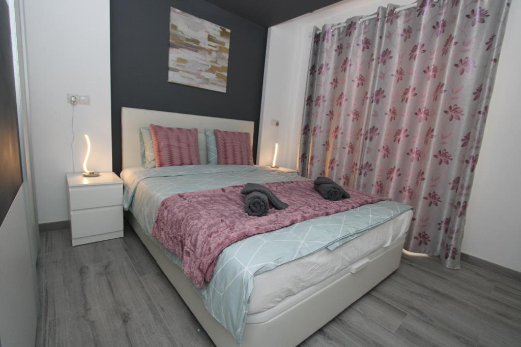 Postel nebo postele na pokoji v ubytování San Rafael Apartment Los Boliches