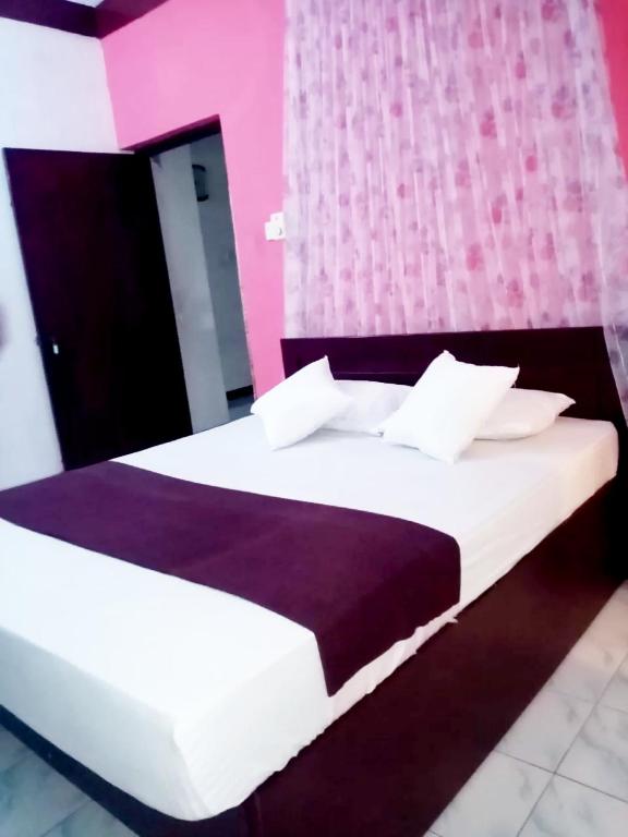 Postel nebo postele na pokoji v ubytování Chandi Mahal HomeStay