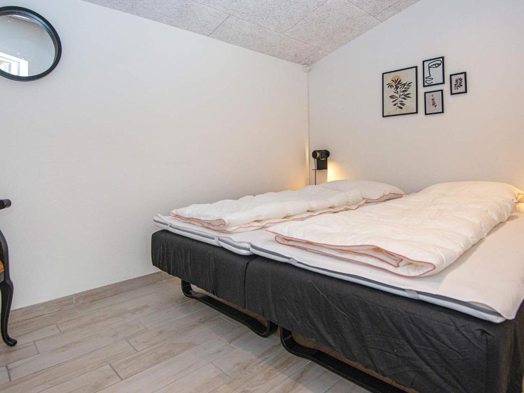 Postel nebo postele na pokoji v ubytování Luxury Spa Retreat in Arrild - By Traum Ferienwohnungen