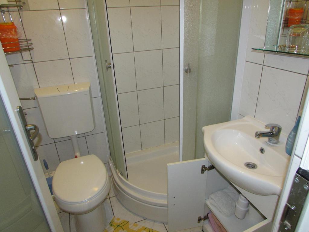 Koupelna v ubytování Rooms Vendi