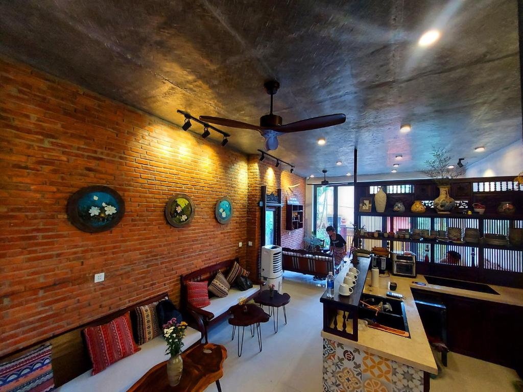 Posezení v ubytování Hoi An Ti Hon House