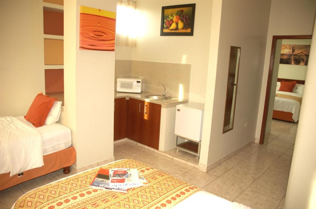 Kuchyň nebo kuchyňský kout v ubytování Hotel Air Suites
