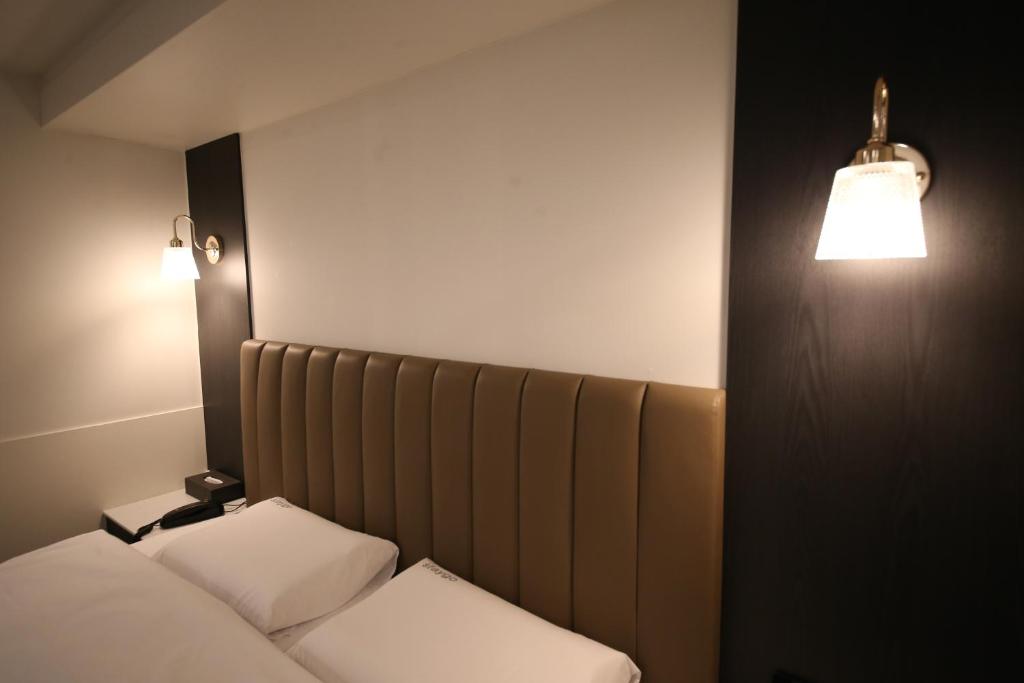 Postel nebo postele na pokoji v ubytování 25 Hotel