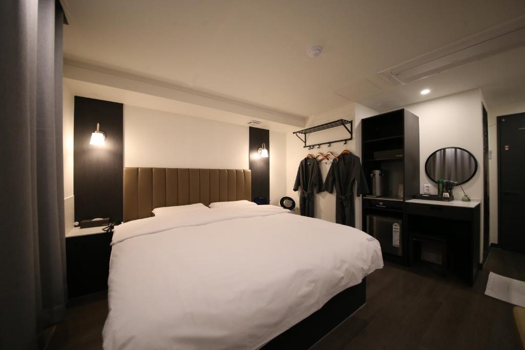 Postel nebo postele na pokoji v ubytování 25 Hotel