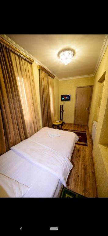 Postel nebo postele na pokoji v ubytování HOTEL VLADi
