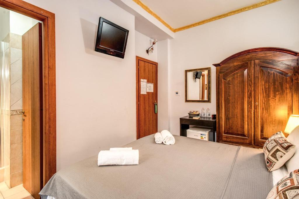 A bed or beds in a room at GUEST HOUSE GOITO