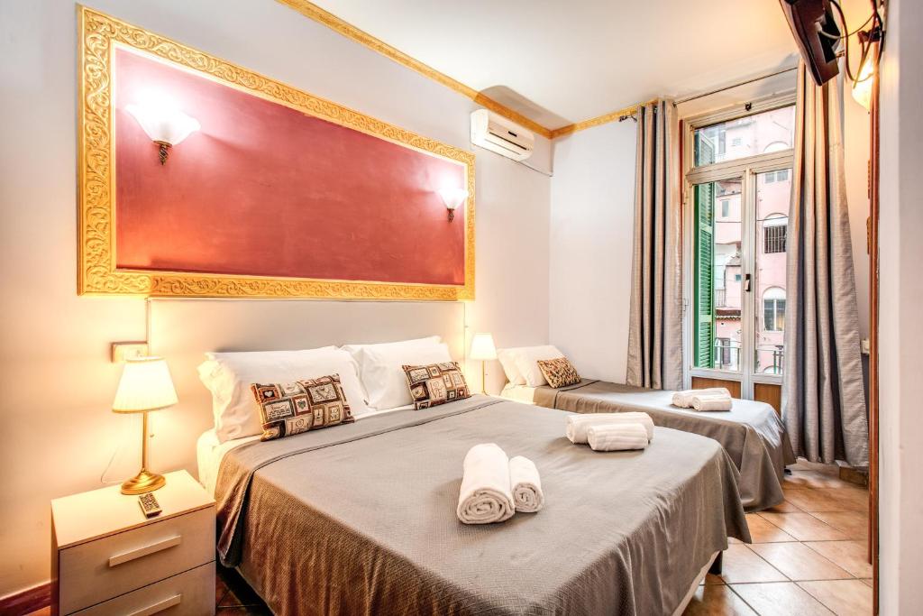 A bed or beds in a room at GUEST HOUSE GOITO
