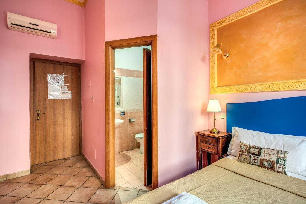 A bed or beds in a room at GUEST HOUSE GOITO