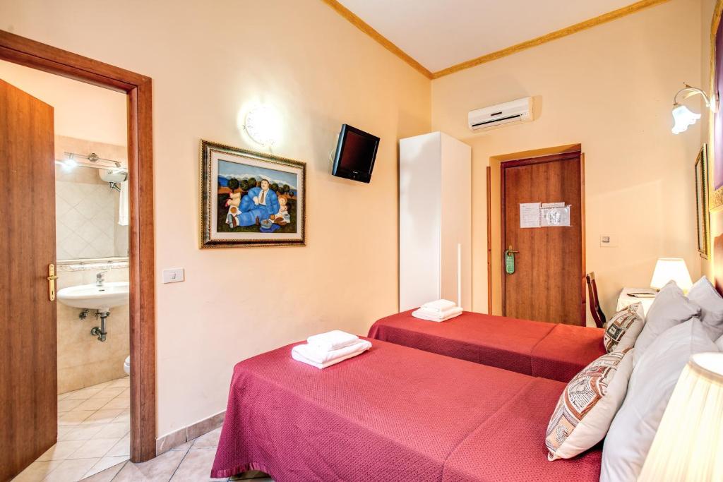 A bed or beds in a room at GUEST HOUSE GOITO