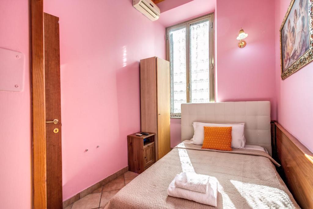 A bed or beds in a room at GUEST HOUSE GOITO