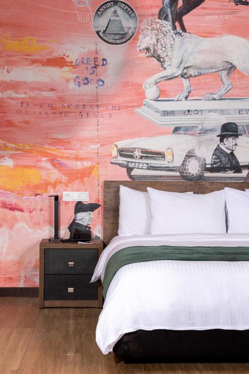 Postel nebo postele na pokoji v ubytování Theory Hotel