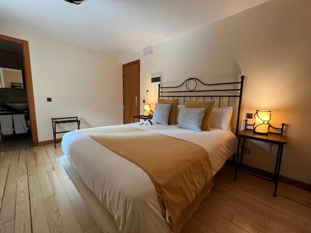 Кровать или кровати в номере Corzo Hotel