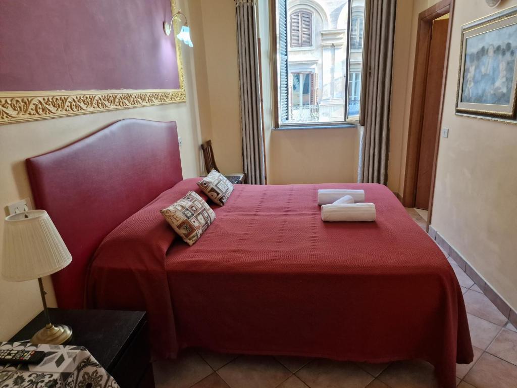 A bed or beds in a room at GUEST HOUSE GOITO