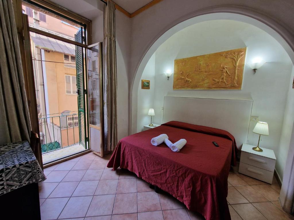 A bed or beds in a room at GUEST HOUSE GOITO