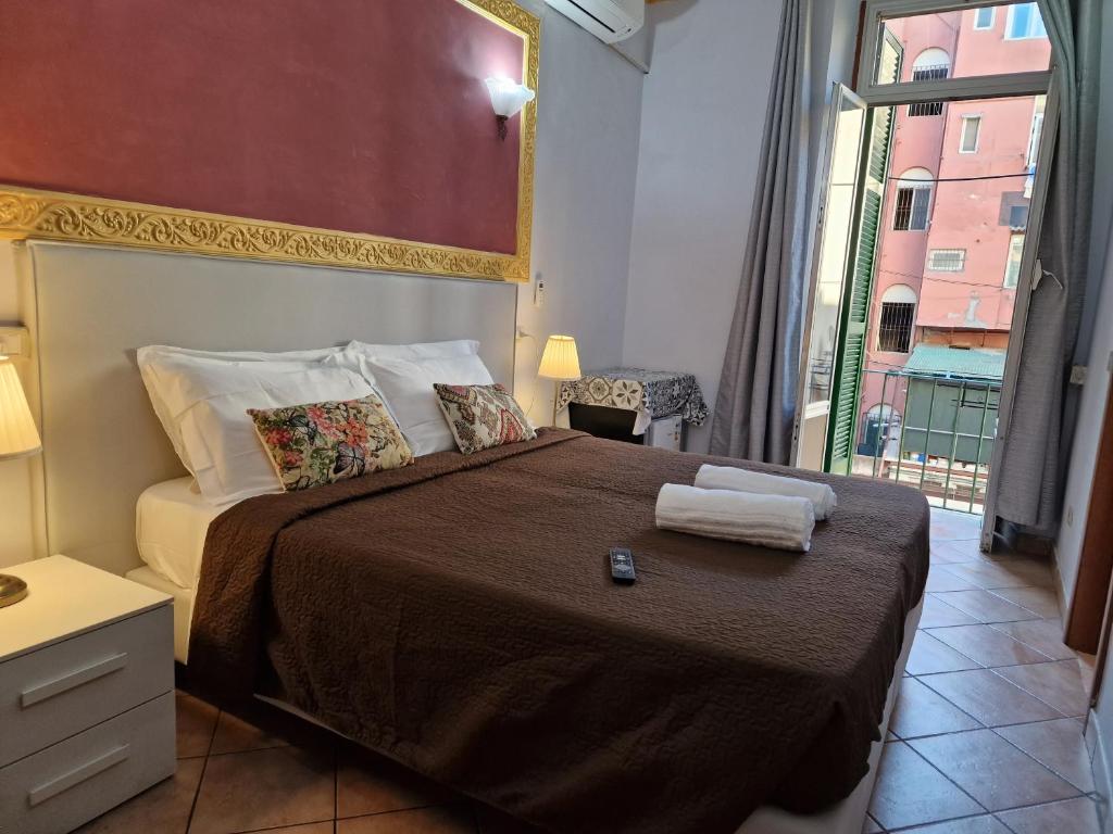 A bed or beds in a room at GUEST HOUSE GOITO