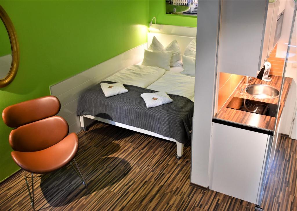 Ένα ή περισσότερα κρεβάτια σε δωμάτιο στο Studio-Apartment Augarten