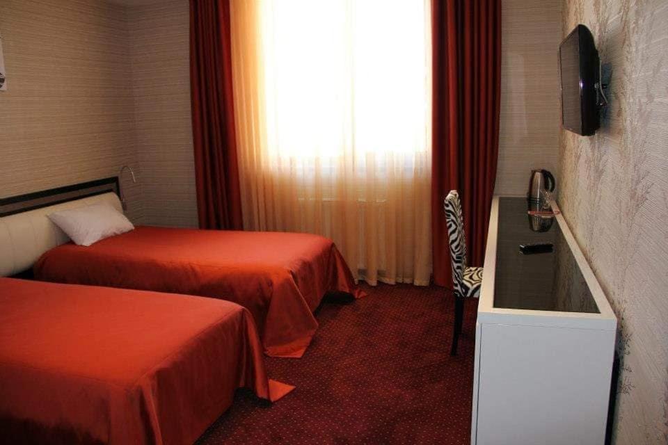 Postel nebo postele na pokoji v ubytování Hotel Villa Palace