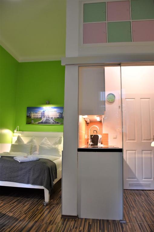 Ένα ή περισσότερα κρεβάτια σε δωμάτιο στο Studio-Apartment Augarten