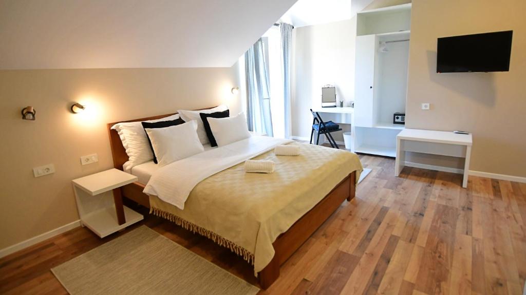 Posteľ alebo postele v izbe v ubytovaní Apartmani Zagi