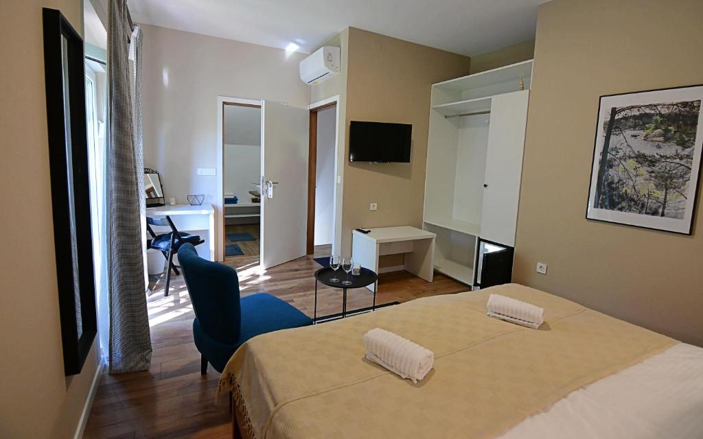 Posteľ alebo postele v izbe v ubytovaní Apartmani Zagi