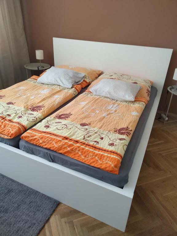 Postel nebo postele na pokoji v ubytování Flat Lesná Brno