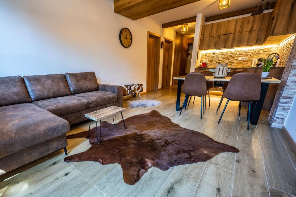 Posezení v ubytování Wellness & Spa Pila Kvilda AP 2 01 a AP 3 07