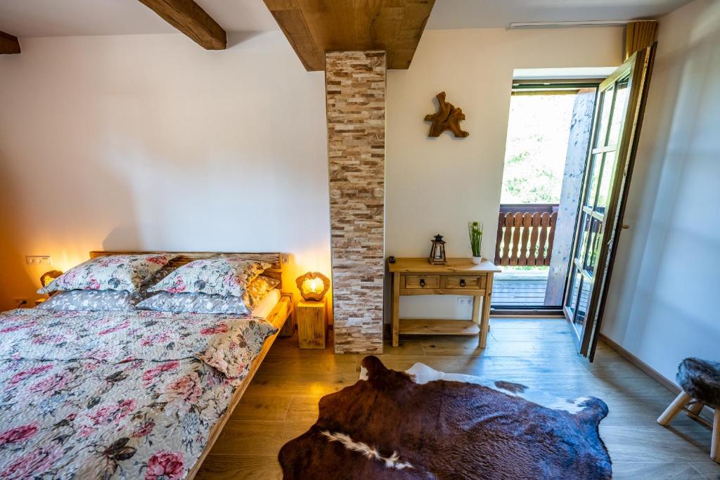 Postel nebo postele na pokoji v ubytování Wellness & Spa Pila Kvilda AP 2 01 a AP 3 07