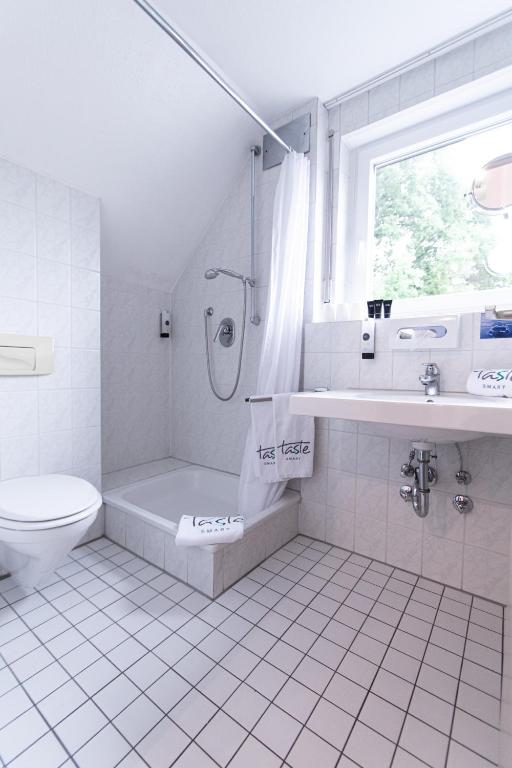 Koupelna v ubytování Taste Smart Hotel Backnang