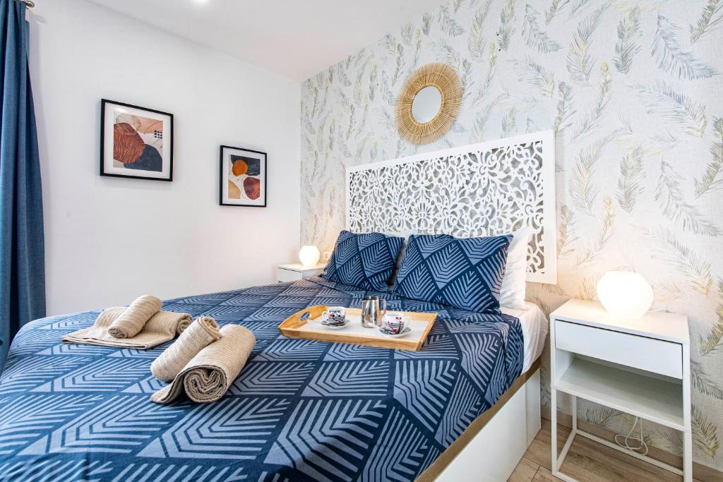 A bed or beds in a room at Ocean Paradise