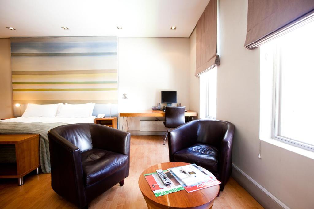 Cama ou camas em um quarto em Hippo Boutique Hotel