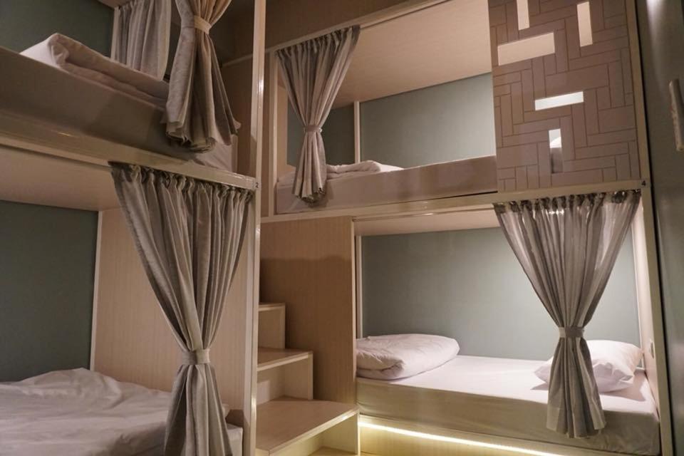 Voodi või voodid majutusasutuse Busket Hostel toas