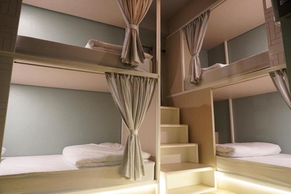 Voodi või voodid majutusasutuse Busket Hostel toas