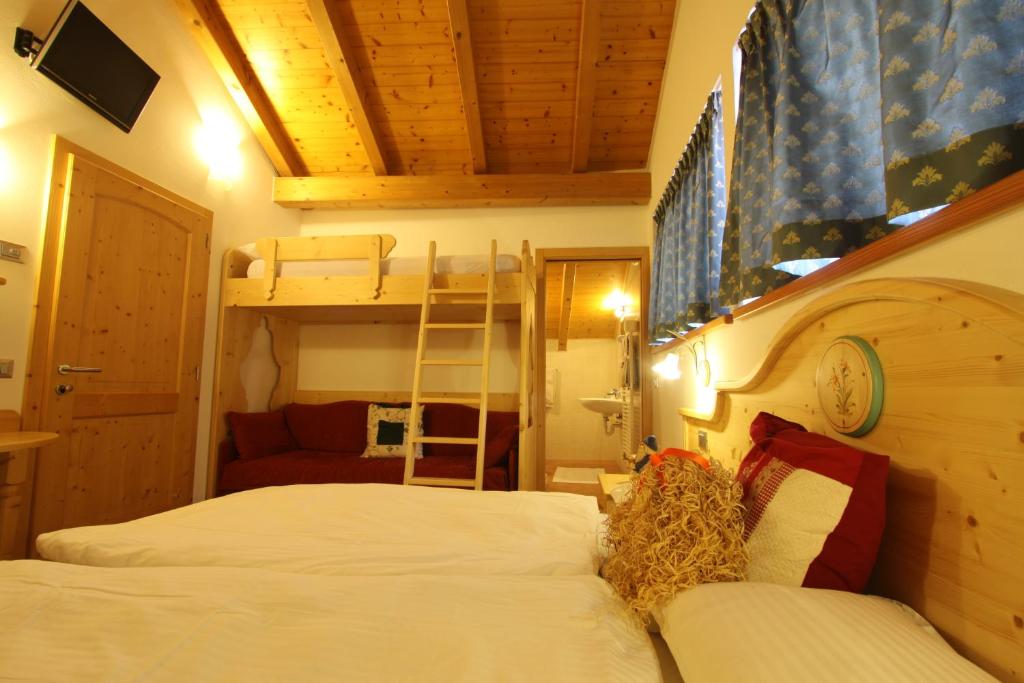 Postel nebo postele na pokoji v ubytování B.& B. Corradini