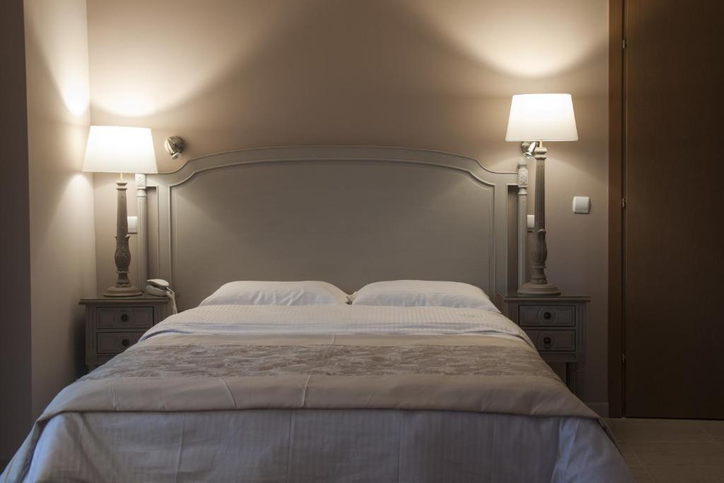 Postel nebo postele na pokoji v ubytování Hotel Marianna