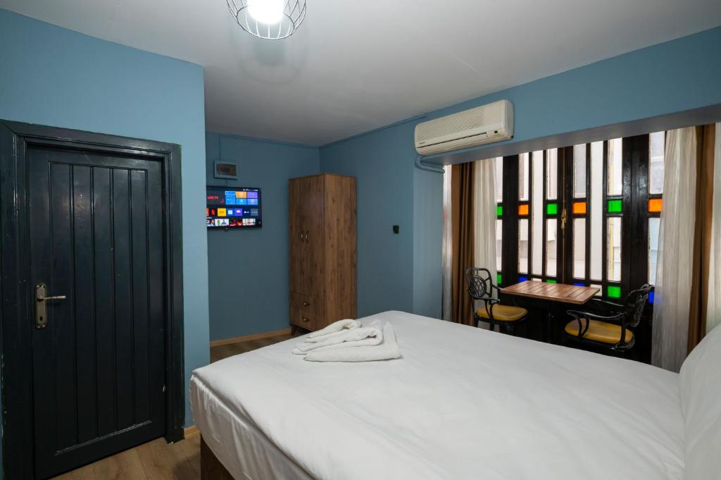 Taksim Antique Hotel客房内的一张或多张床位